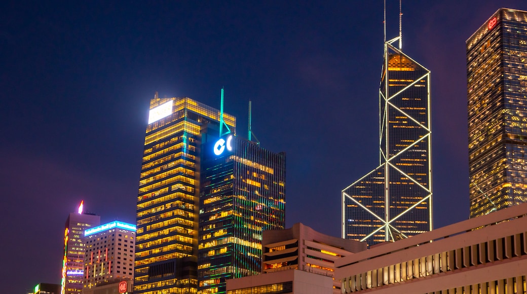 Central featuring a city, night scenes and a high rise building