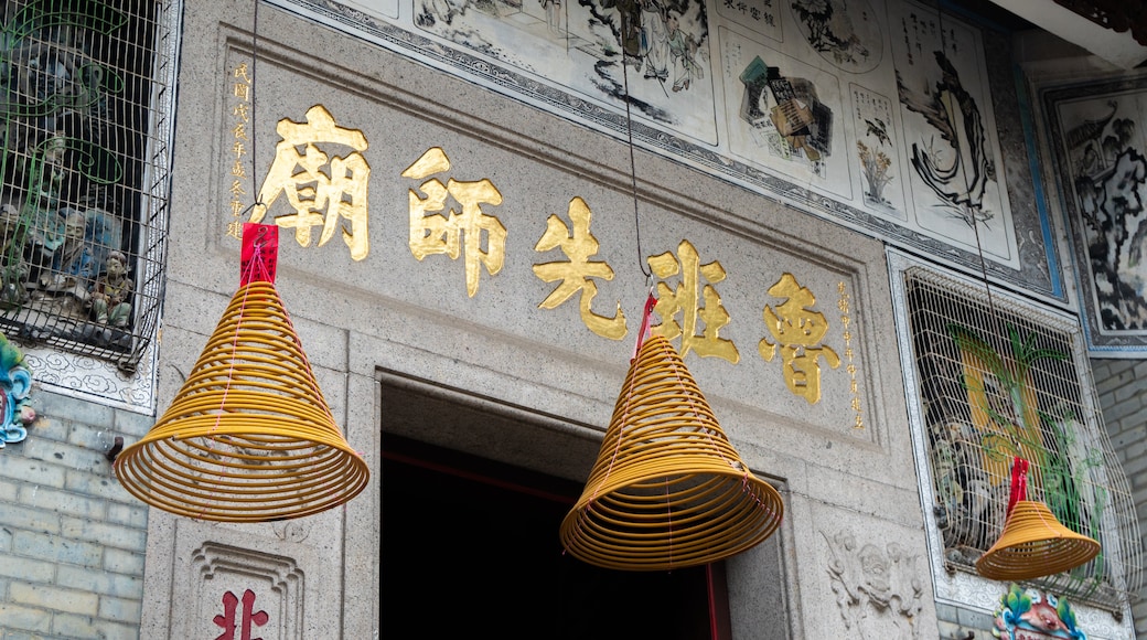 Lo Pan Temple featuring signage and heritage elements