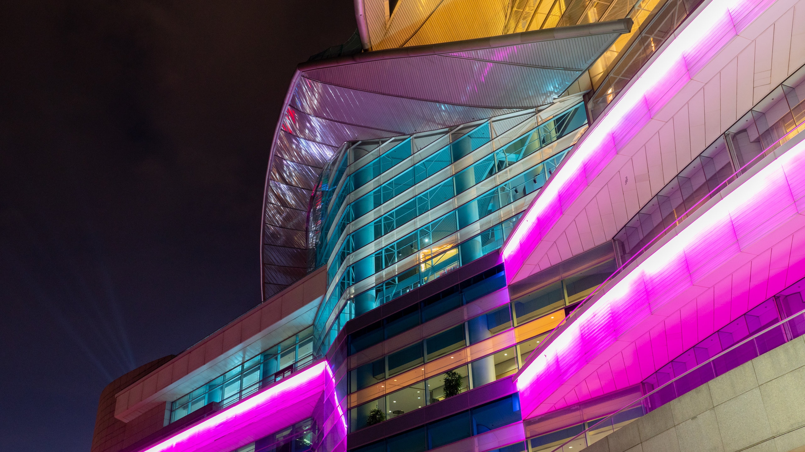 Hong Kong Convention and Exhibition Centre featuring night scenes and modern architecture