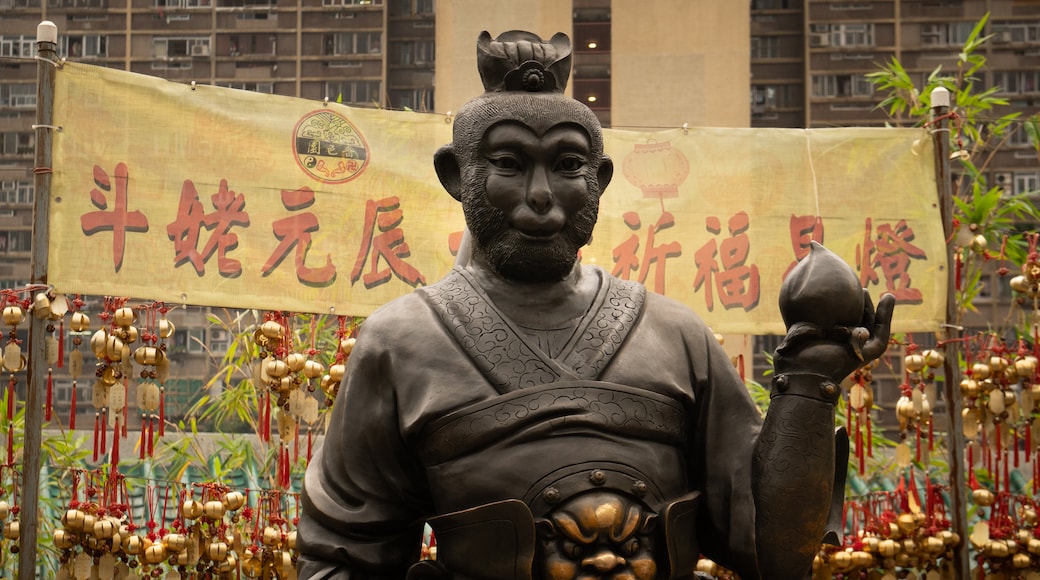 Wong Tai Sin Temple which includes a statue or sculpture, heritage elements and signage