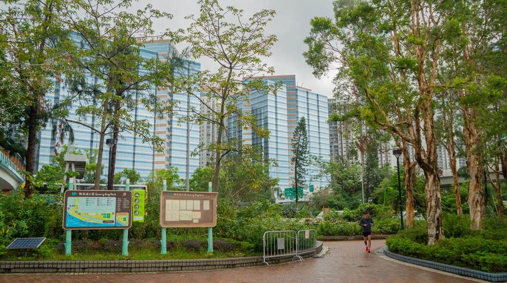 The Grand Promenade featuring a garden and signage