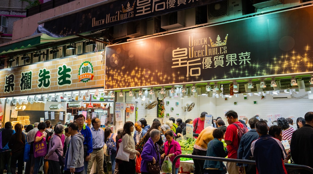 Wan Chai Road showing night scenes, signage and street scenes