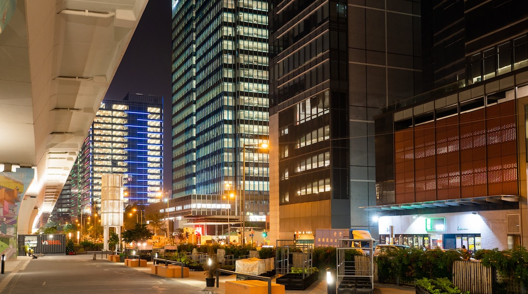 Kwun Tong Promenade showing night scenes, street scenes and a city