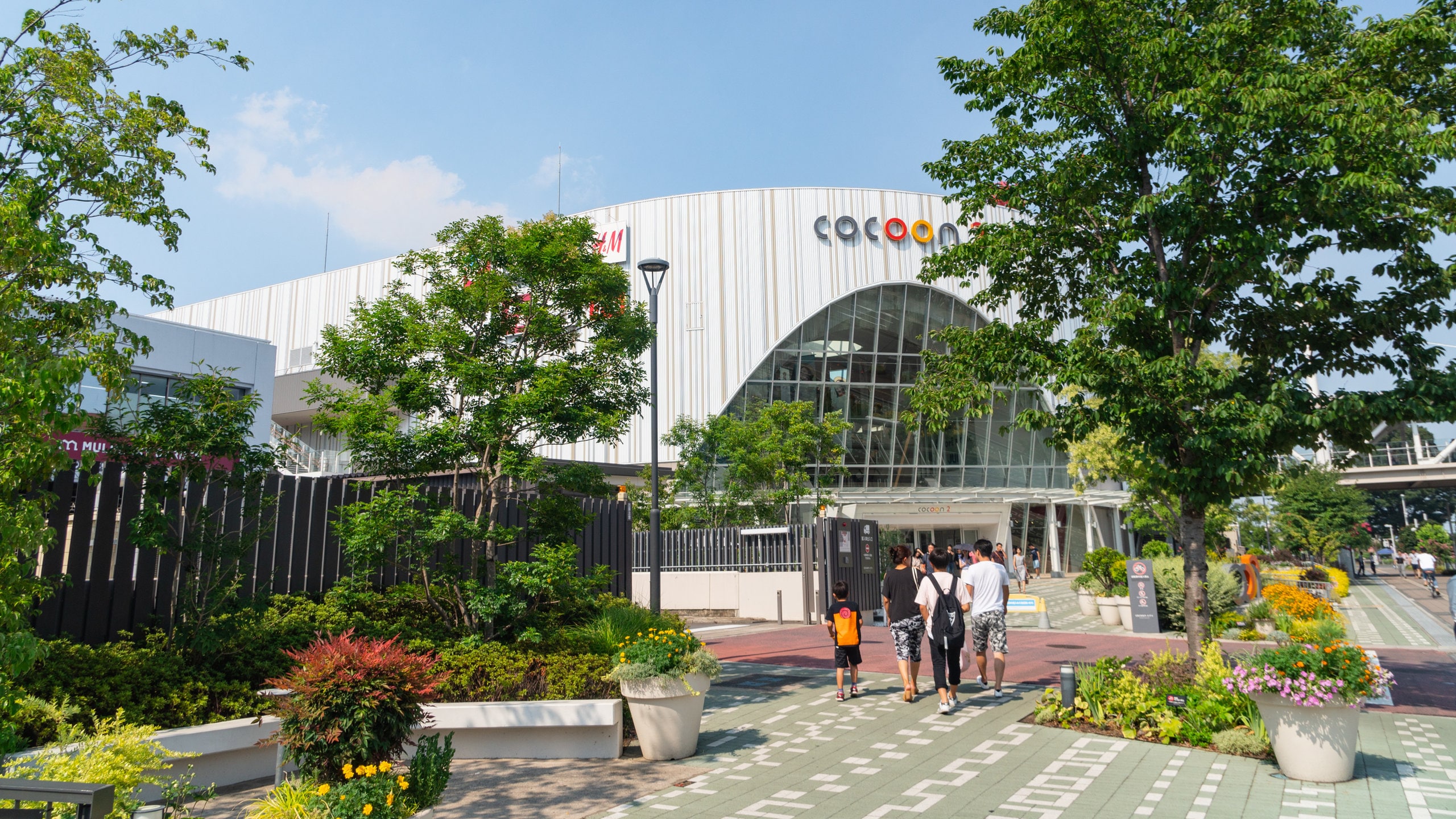 Saitama showing a park as well as a family