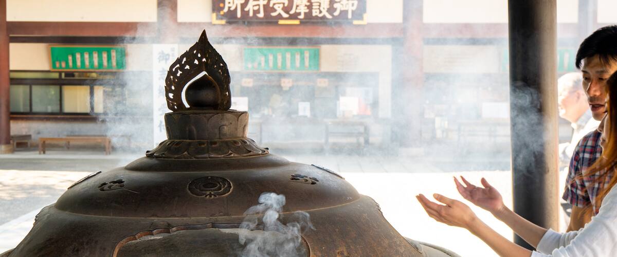Narita Tourist Pavilion featuring mist or fog as well as a couple