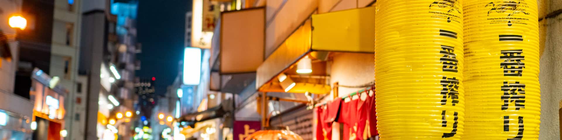 Kanda featuring signage and night scenes