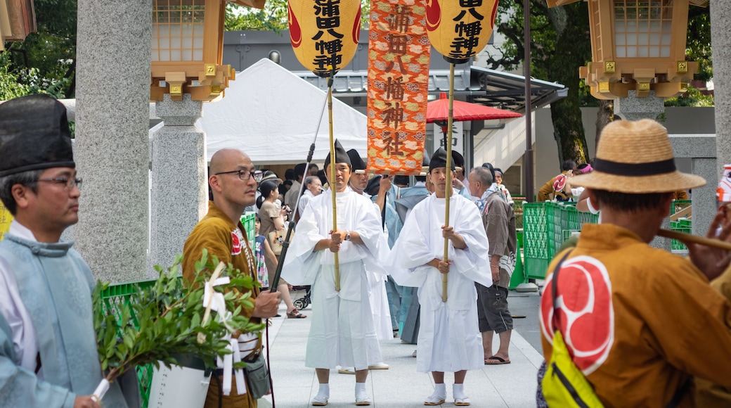 Kamata which includes street scenes as well as a small group of people