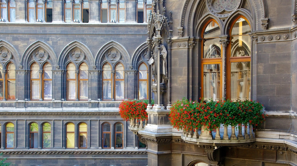 Vienna City Hall showing a city, heritage architecture and flowers