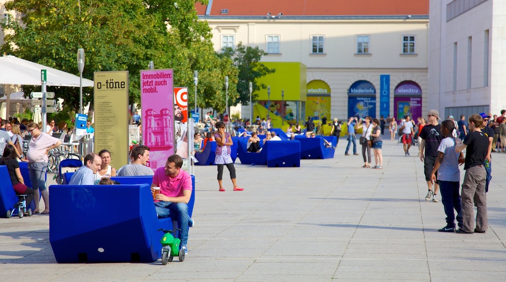 Museumsquartier showing outdoor eating, a city and street scenes