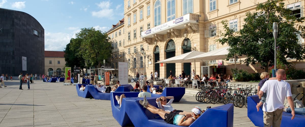 Museumsquartier showing street scenes and a city as well as a small group of people