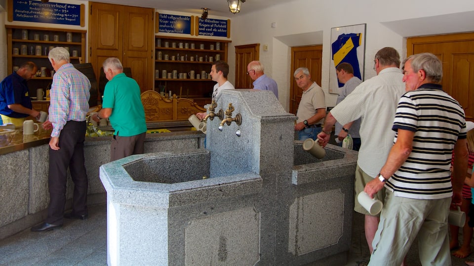 Augustiner Brewery which includes drinks or beverages, interior views and a bar