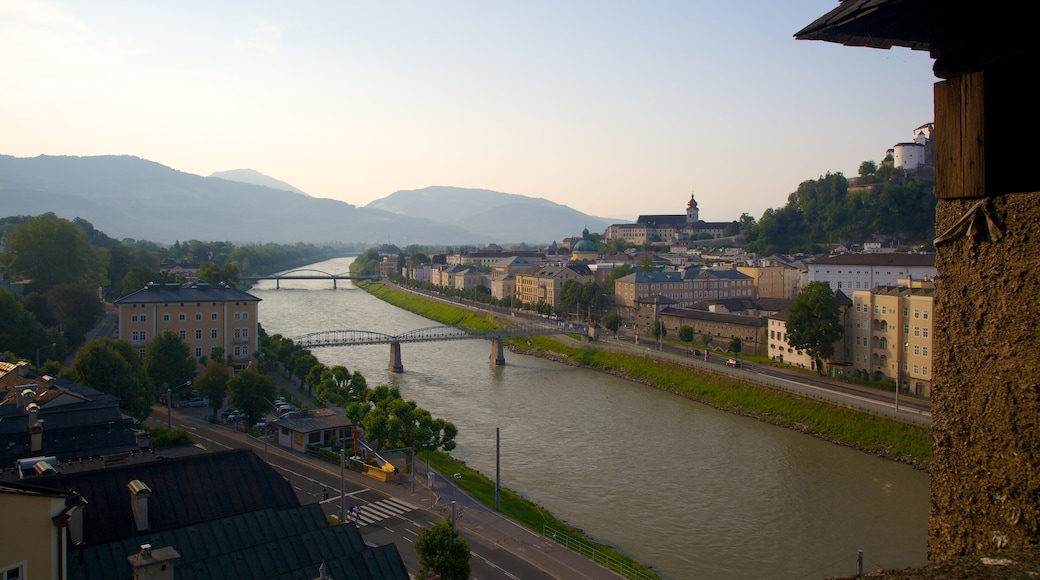 Kapuzinerberg Hill which includes a bridge and a river or creek