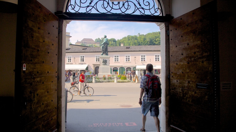 Mozart Square which includes a monument, a statue or sculpture and cycling