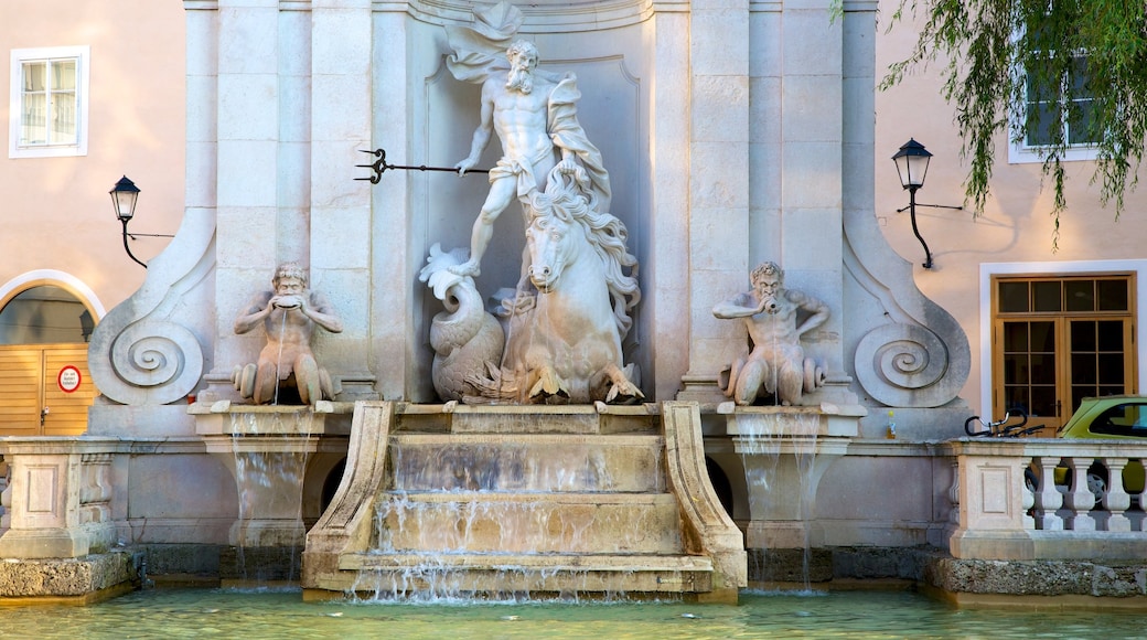 Salzburgo ofreciendo patrimonio de arquitectura, una estatua o escultura y una fuente