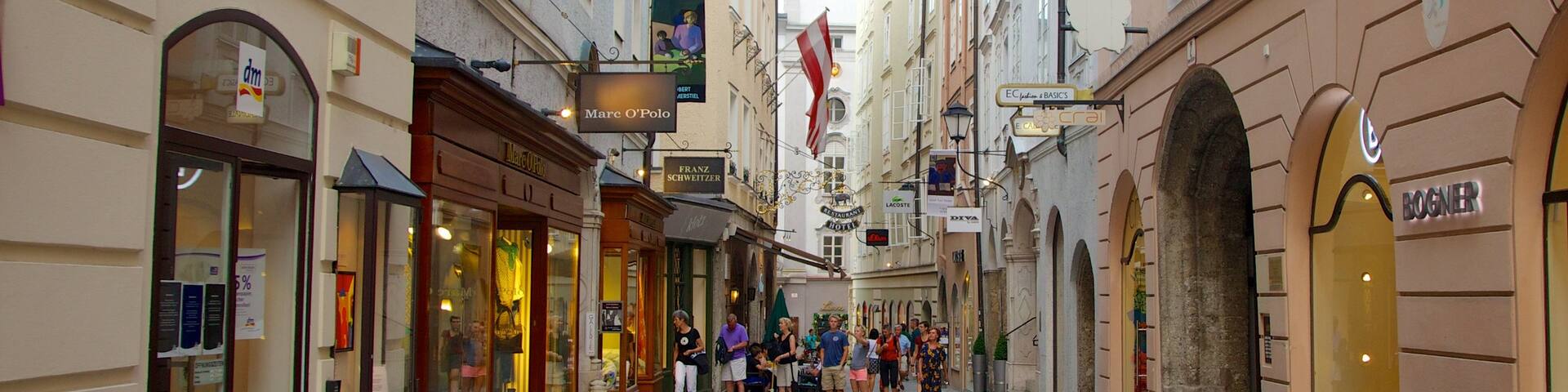 Salzburg featuring signage, a city and street scenes