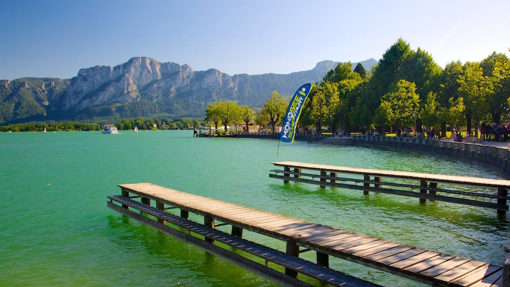 Mondsee which includes a lake or waterhole, a bay or harbour and mountains