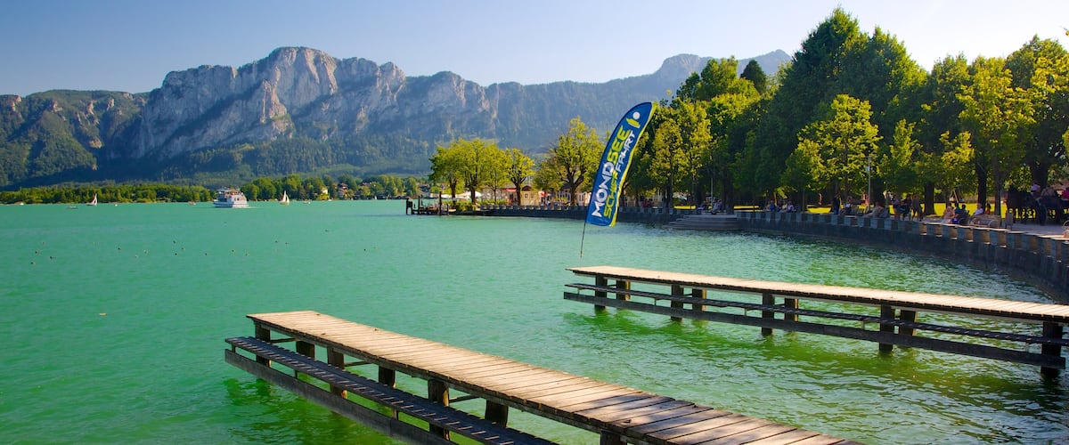 Mondsee featuring a bay or harbor, a lake or waterhole and mountains