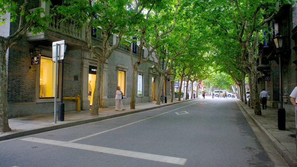 Xintiandi which includes street scenes and a city