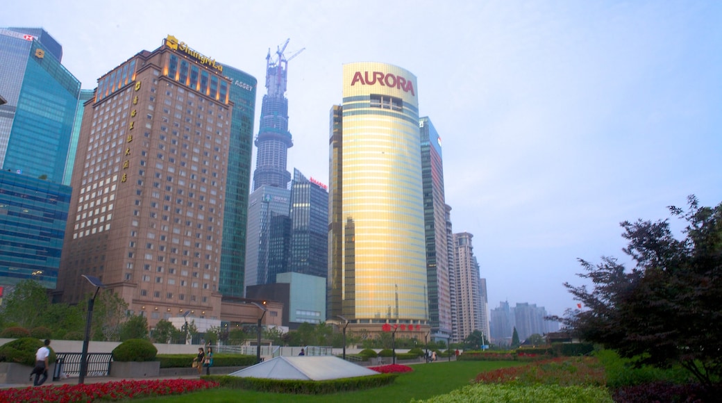 Pudong Riverside Promenade and Park which includes modern architecture, a city and a high-rise building