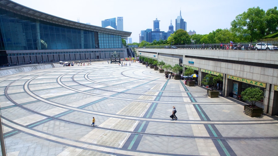 Shanghai Science and Technology Museum showing a city, a square or plaza and modern architecture