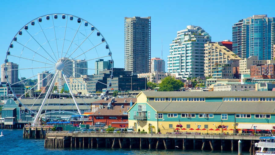 Seattle Great Wheel ofreciendo arquitectura moderna, un edificio alto y paseos