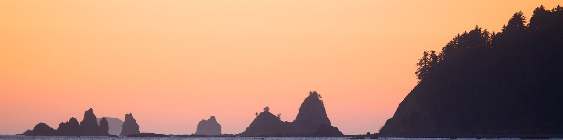 Rialto Beach showing waves, a sunset and a beach