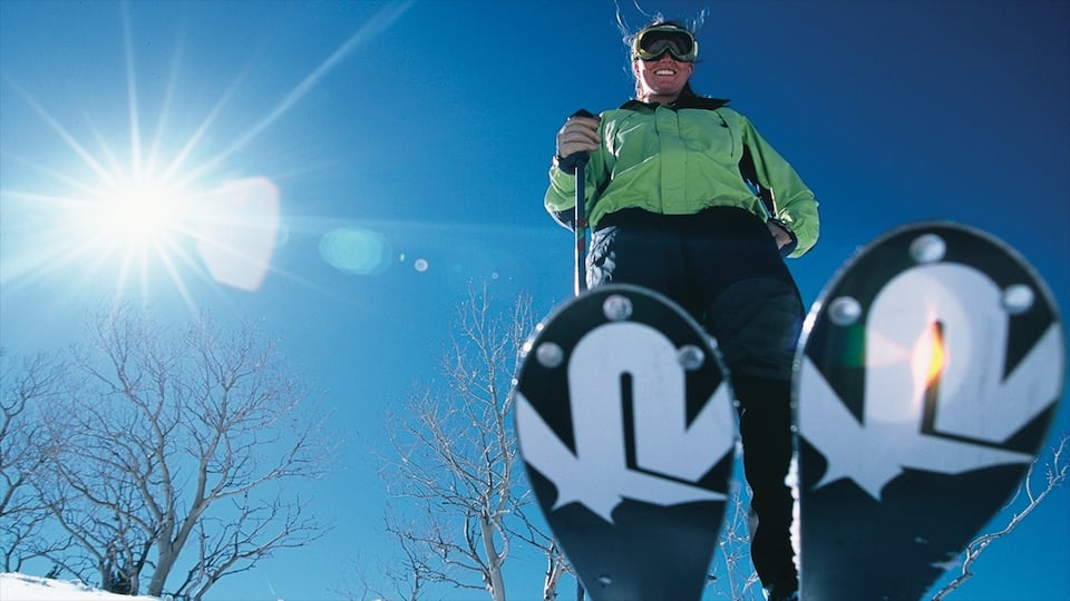 Glenwood Springs featuring snow skiing and snow as well as an individual male