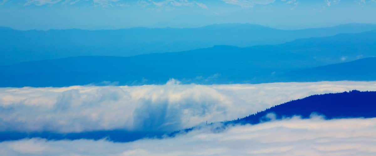 Orcas Island featuring mist or fog, landscape views and mountains