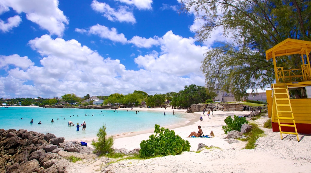 Miami Beach showing a sandy beach, swimming and a coastal town