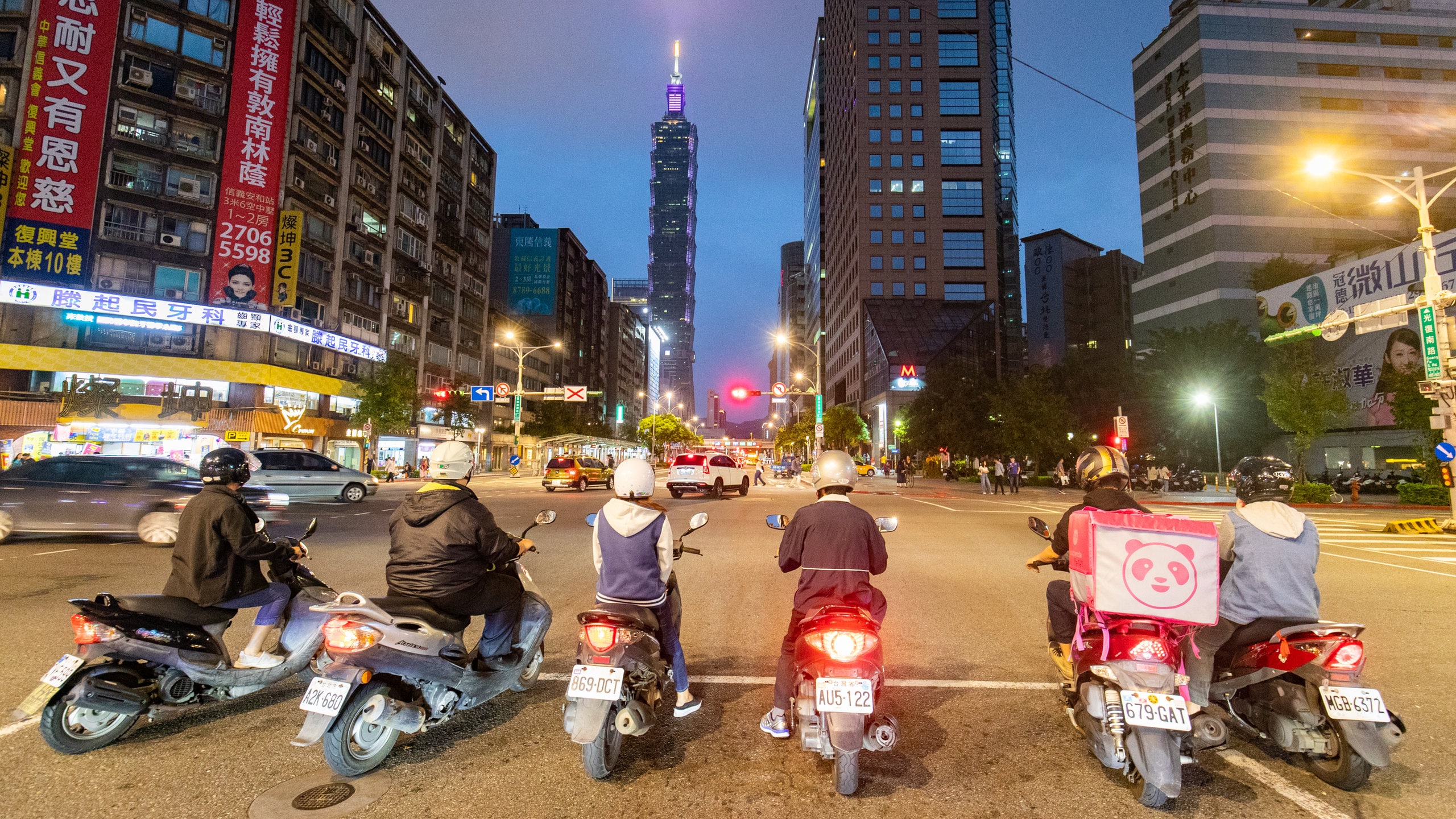 Taipei which includes night scenes, a city and street scenes