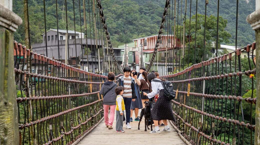 Shifen which includes a bridge as well as a small group of people