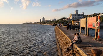 Tamsui showing a sunset, a coastal town and general coastal views