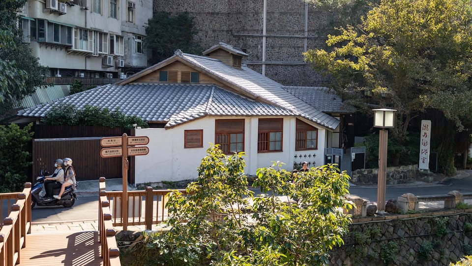 Beitou showing motorbike riding as well as a couple