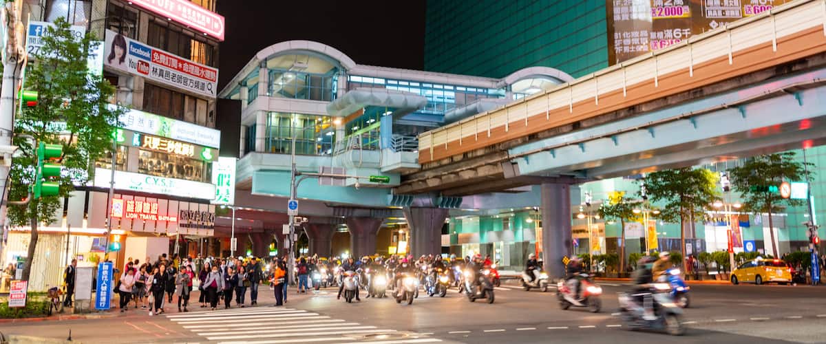 Daan showing night scenes, motorcycle riding and a city