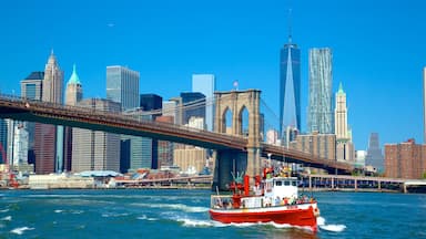 New York showing boating, a bridge and a city