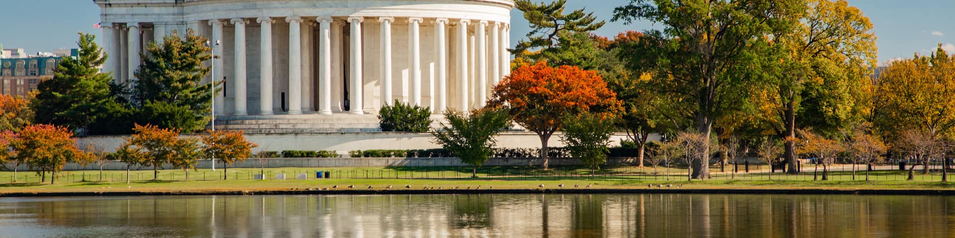 Tidal Basin featuring an administrative buidling, heritage architecture and a lake or waterhole
