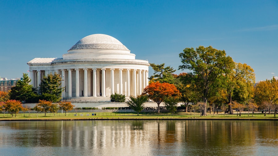 Jefferson Memorial reflected in the Tidal Basin surrounded by autumn trees in Washington, D.C.
