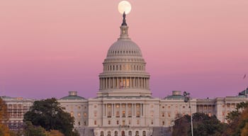 United States Capitol featuring heritage architecture, a sunset and an administrative buidling