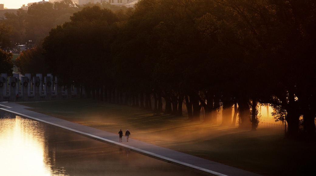 Washington showing a sunset, a lake or waterhole and a garden