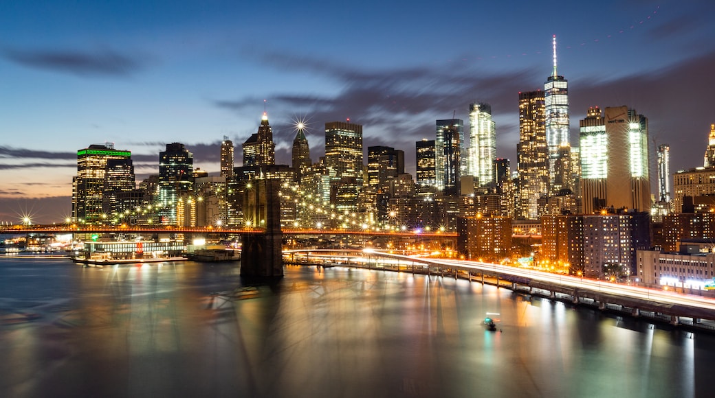 Manhattan Bridge showing night scenes, a city and a bridge