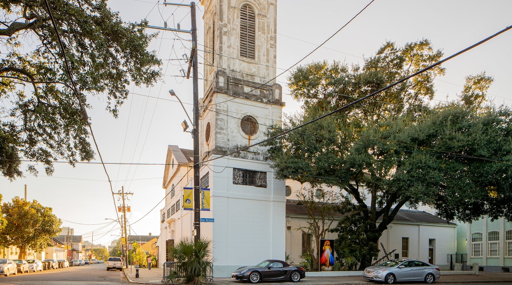 Saint Augustine Church which includes a church or cathedral and a sunset