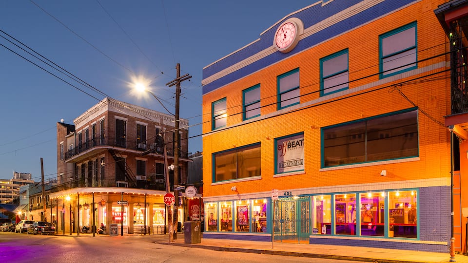 Frenchmen Street showing night scenes, a small town or village and street scenes