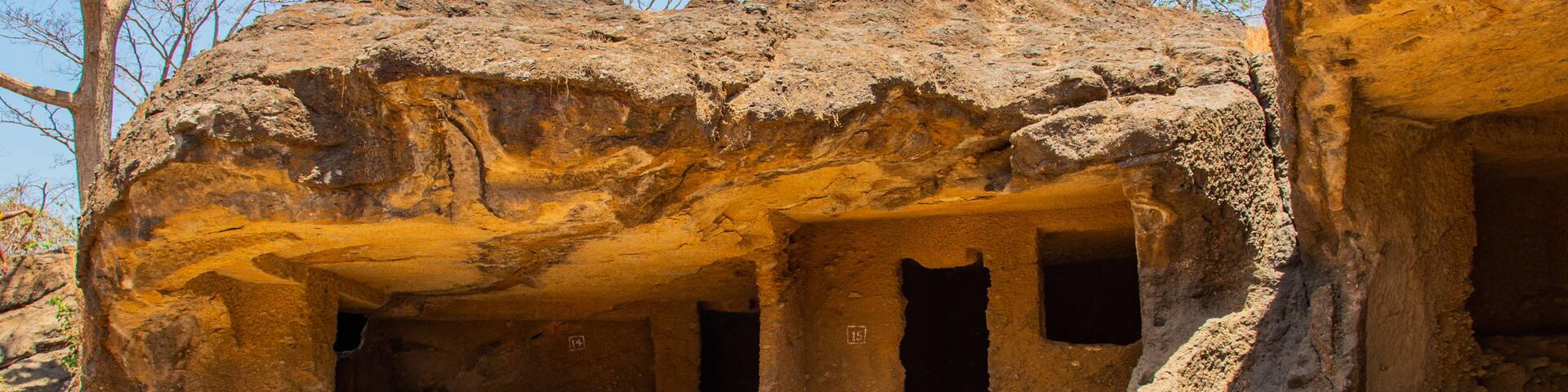 Kanheri Caves featuring heritage elements and desert views