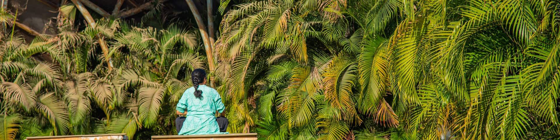 Central Park, Navi Mumbai showing a garden as well as an individual femail