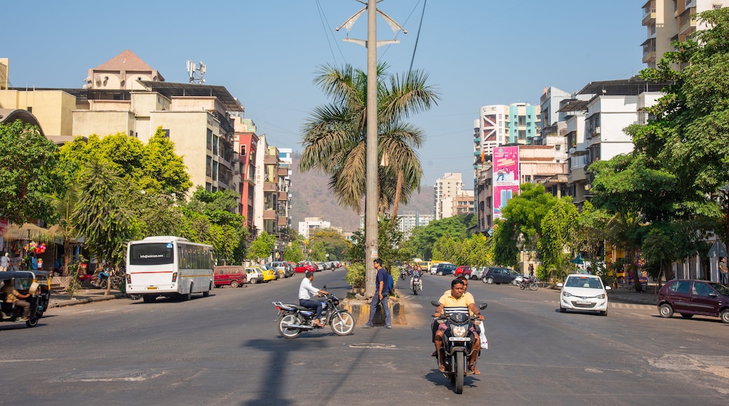 Kharghar showing motorcycle riding and street scenes