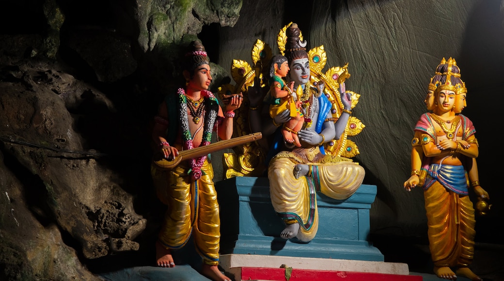 Batu Caves showing interior views, heritage elements and religious aspects