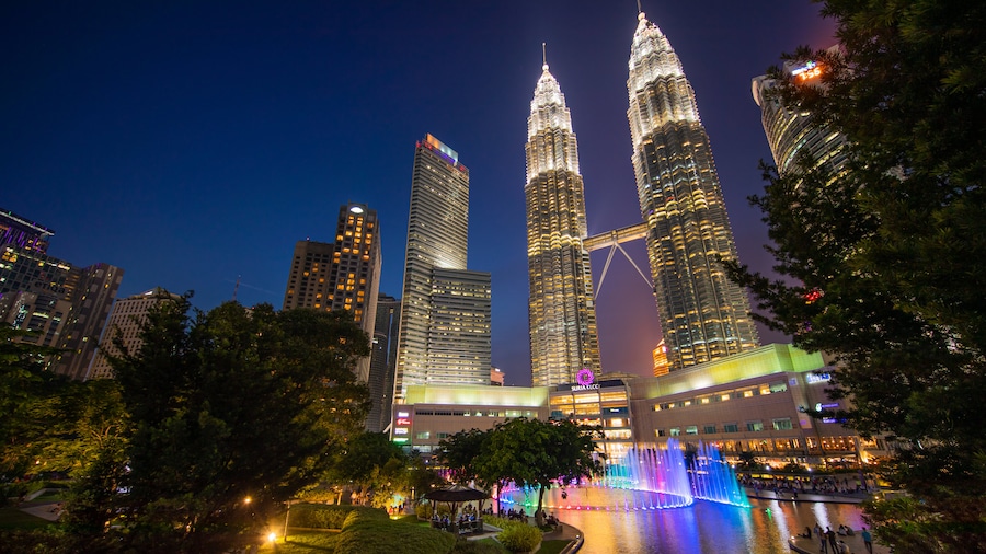 KLCC Park featuring a high rise building, a city and night scenes