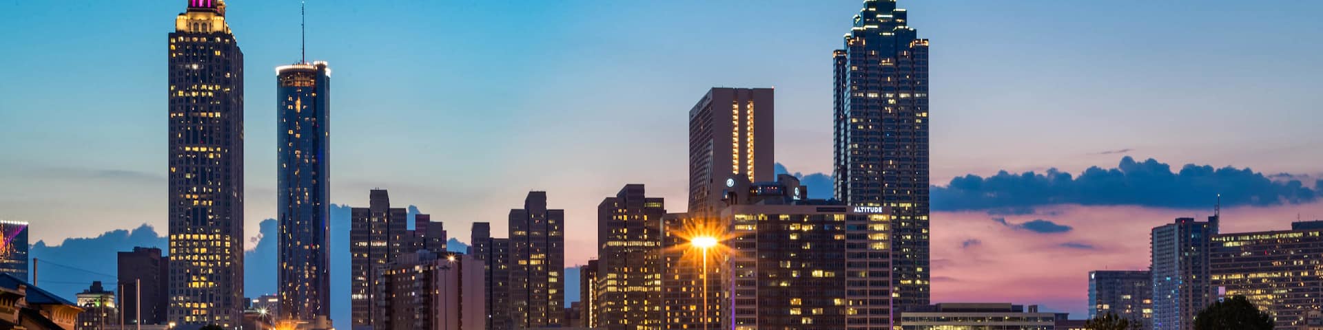 Downtown Atlanta which includes landscape views, night scenes and a sunset