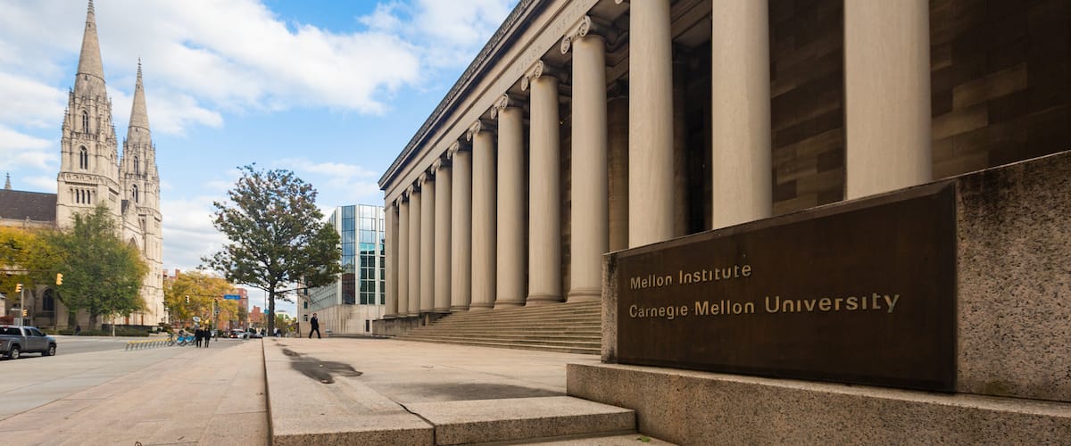 Oakland showing an administrative buidling, heritage architecture and signage