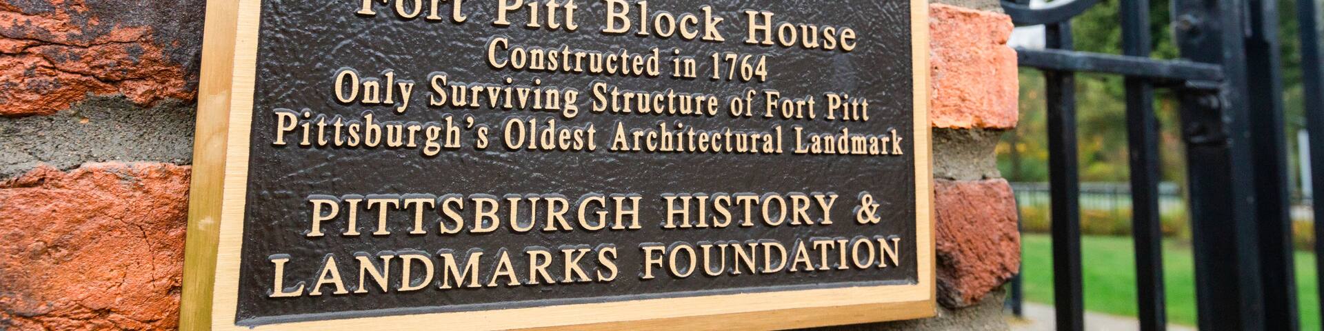 Fort Pitt Block House featuring signage and heritage elements